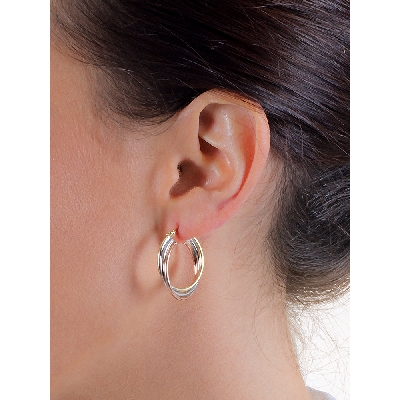 Aros entrelazados en oro blanco, amarillo y rosa de 18k