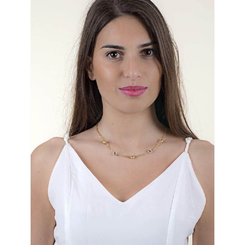 Cadena en oro amarillo y oro blanco 18k ruedas diamantadas Cadena en oro amarillo y oro blanco 18k ruedas diamantadas