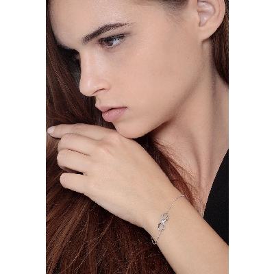 Pulsera fantasía mujer en oro blanco 18K  infinito