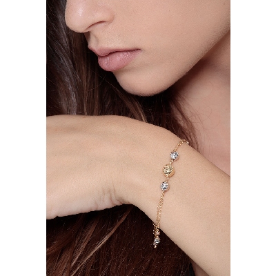 Pulsera en oro tricolor 18k con esferas diamantadas