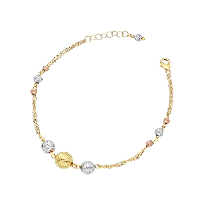Pulsera en oro tricolor 18k con esferas diamantadas