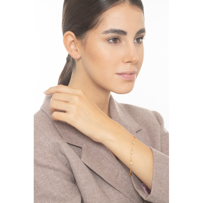 Brazalete en oro amarillo 18k con 7 charms redondos Brazalete en oro amarillo 18k con 7 charms redondos