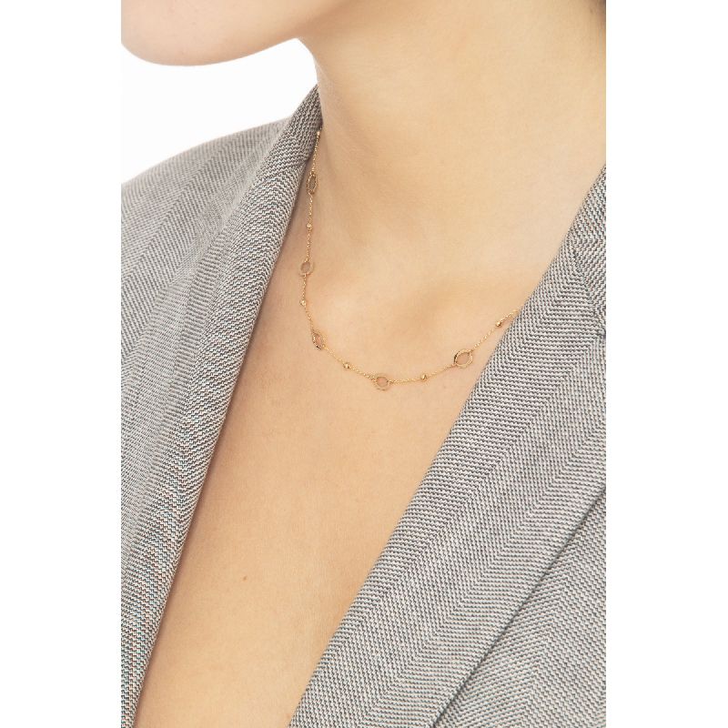 Collar en oro amarillo 18k con bolitas y aros  Collar en oro amarillo 18k con bolitas y aros