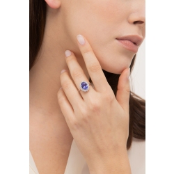 Anillo con halo en oro blanco 18k con tanzanita ovalada y diamantes 2