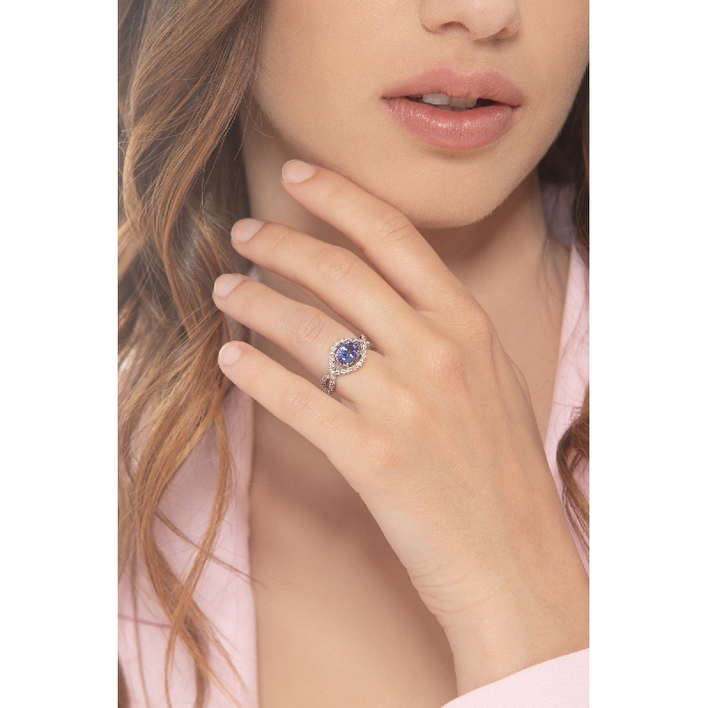 Anillo oro blanco 18k con tanzanita y diamantes entrelazados