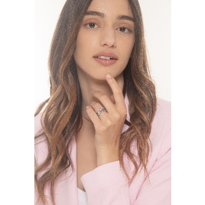 Anillo banda cruzada Oro Blanco 18k con diamante central 0,25 ct