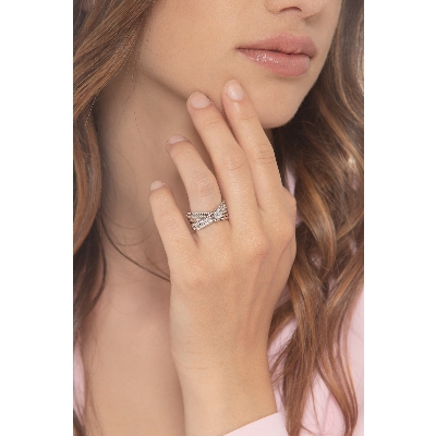 Anillo banda cruzada Oro Blanco 18k con diamante central 0,25 ct