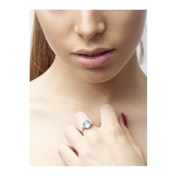 Anillo en Oro Blanco 18k con Acuamarina central y diamantes 2