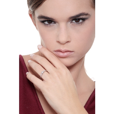 Anillo Eternity en Oro Blanco 18k con Diamante central 0.15 ct