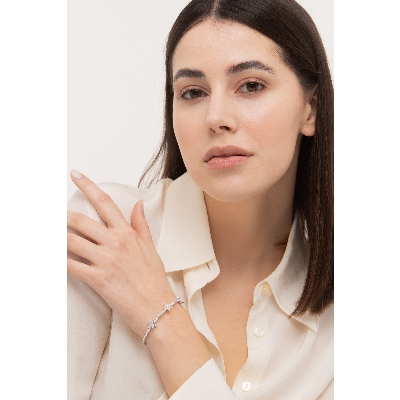 Pulsera de oro blanco 18k con tres estrellas de diamantes