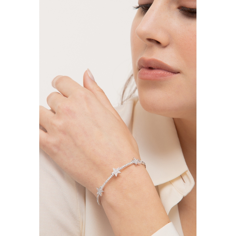 Pulsera de oro blanco 18k con tres estrellas de diamantes Pulsera de oro blanco 18k con tres estrellas de diamantes