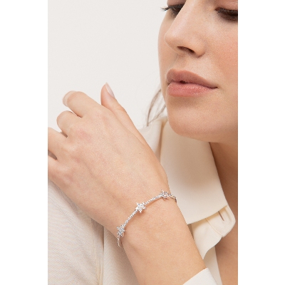 Pulsera de oro blanco 18k con tres estrellas de diamantes