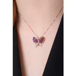 Collar con colgante mariposa en oro rosa con diamantes y rubíes 2