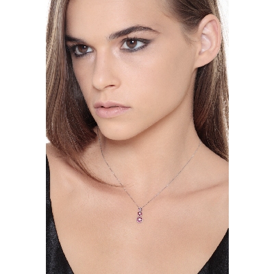 Collar trilogy en oro blanco 18k con tres flores rubies