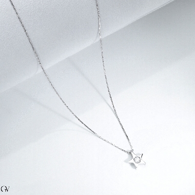 Collar oro blanco 18k colgante estrella diamante
