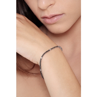 Pulsera riviere en oro blanco 18k con diamantes negros y blancos
