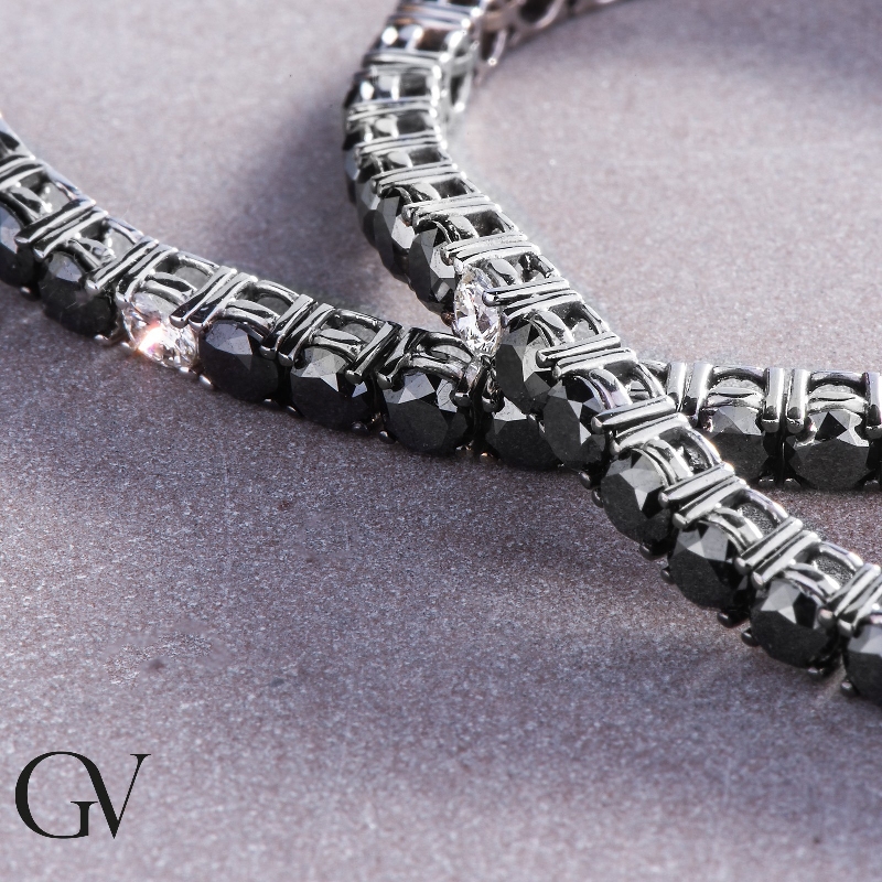 Pulsera Tennis hilo en oro blanco 18k engastada con diamantes negros y diamantes