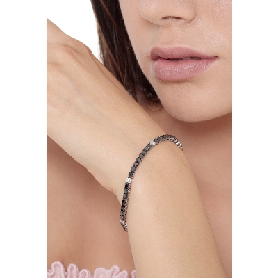 Pulsera Tennis hilo en oro blanco 18k engastada con diamantes negros y diamantes