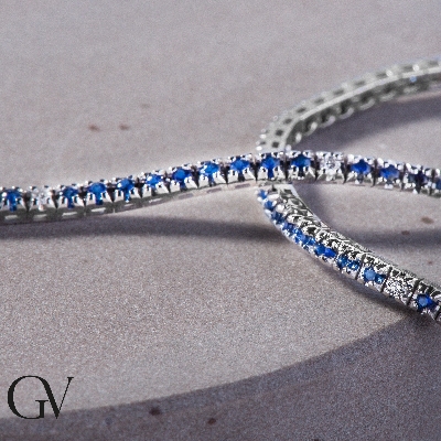 Pulsera tenis oro blanco con zafiros azules y diamantes