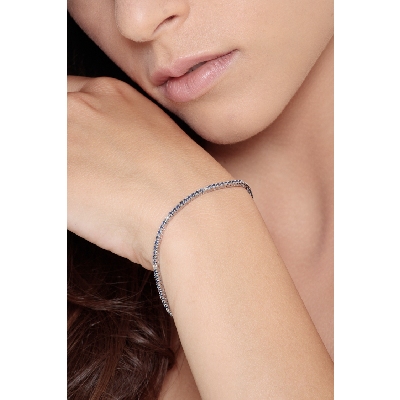 Pulsera tenis oro blanco con zafiros azules y diamantes