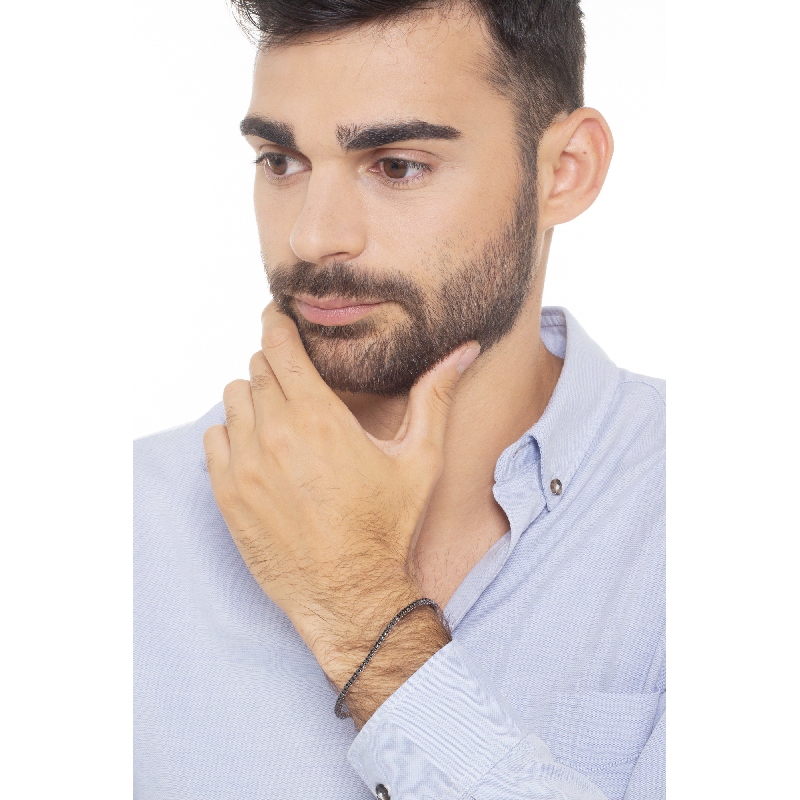 Pulsera riviere con garras en oro blanco de 18k con diamantes negros