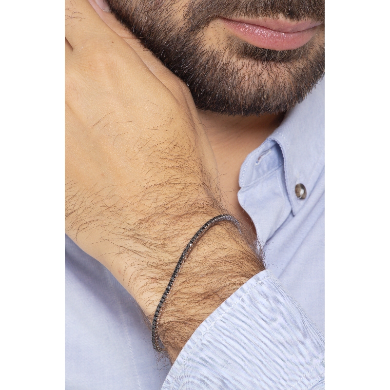 Pulsera riviere con garras en oro blanco de 18k con diamantes negros