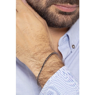 Pulsera riviere con garras en oro blanco de 18k con diamantes negros