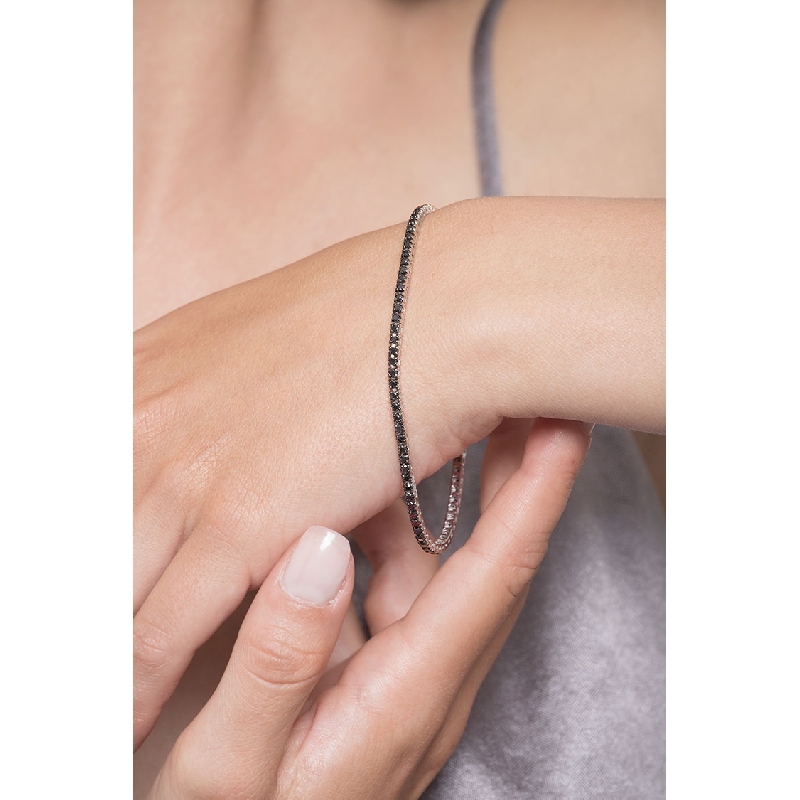 Pulsera riviere con garras en oro blanco de 18k con diamantes negros