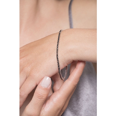 Pulsera riviere con garras en oro blanco de 18k con diamantes negros