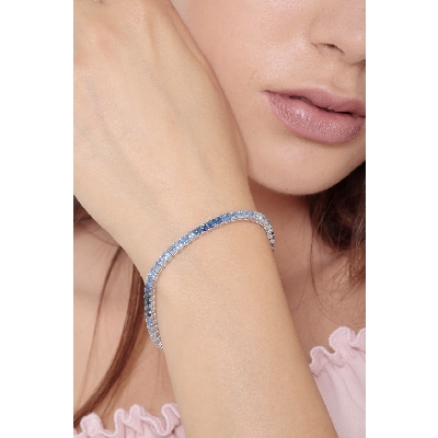 Pulsera Riviera en oro blanco 18 quilates con zafiros azules