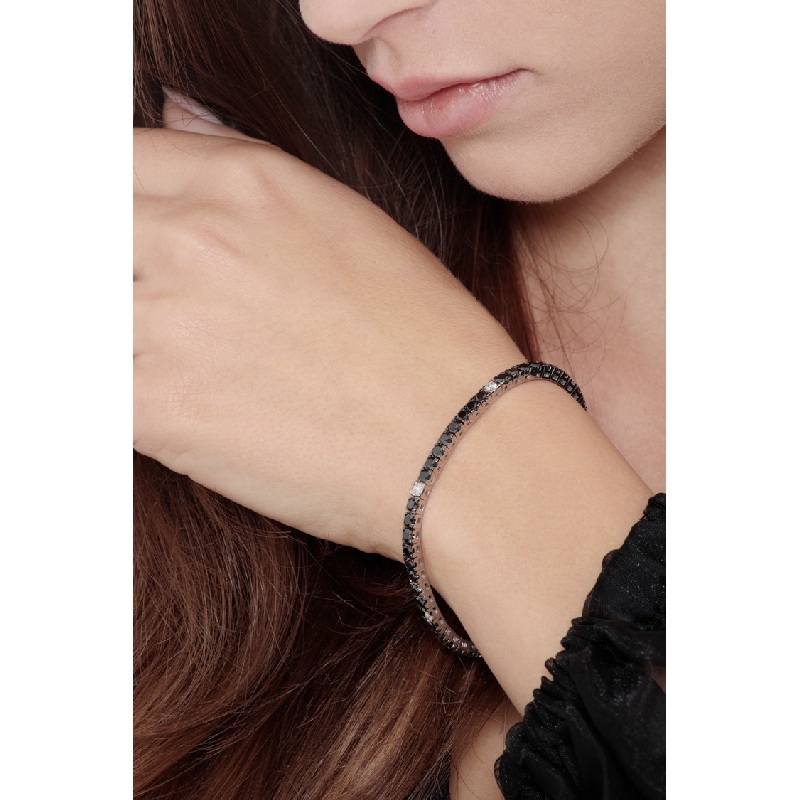 Pulsera Tennis en oro blanco 18 quilates con diamantes negros y blancos  Pulsera Tennis en oro blanco 18 quilates con diamantes negros y blancos