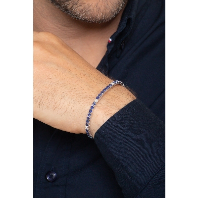 Brazalete tenis en oro blanco de 18 quilates con zafiros azules