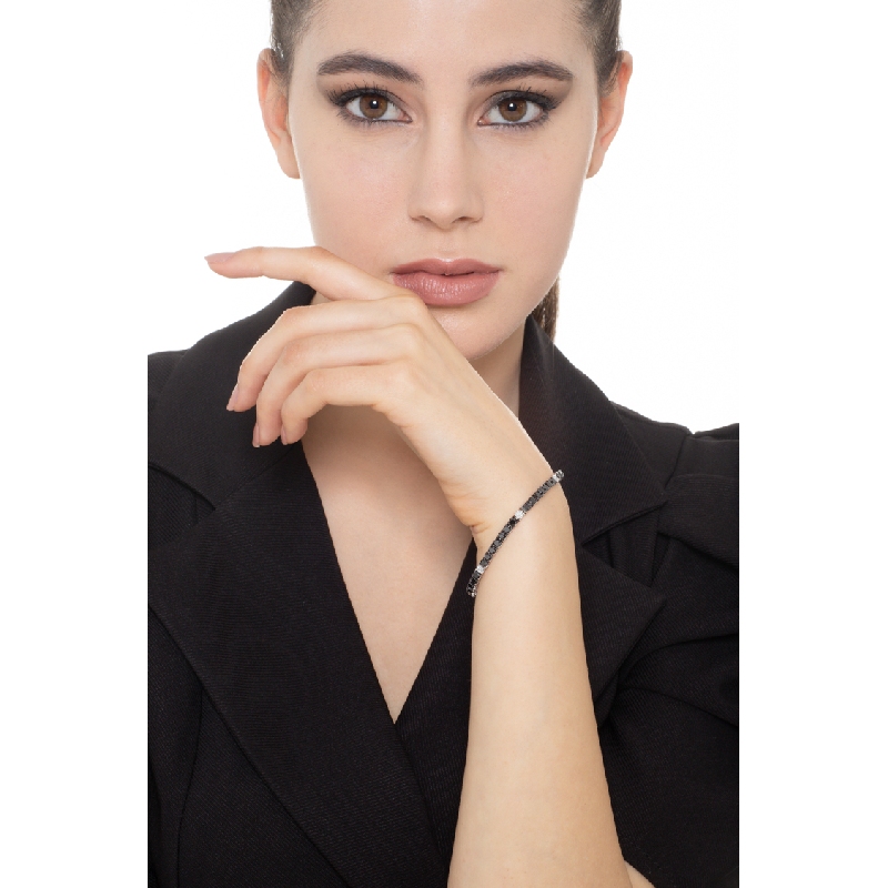 Pulsera de tenis en oro blanco 18k con diamantes negros alternados con diamantes  Pulsera de tenis en oro blanco 18k con diamantes negros alternados con diamantes