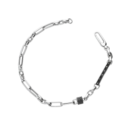 Pulsera en oro blanco 18k con barra y circonitas negras