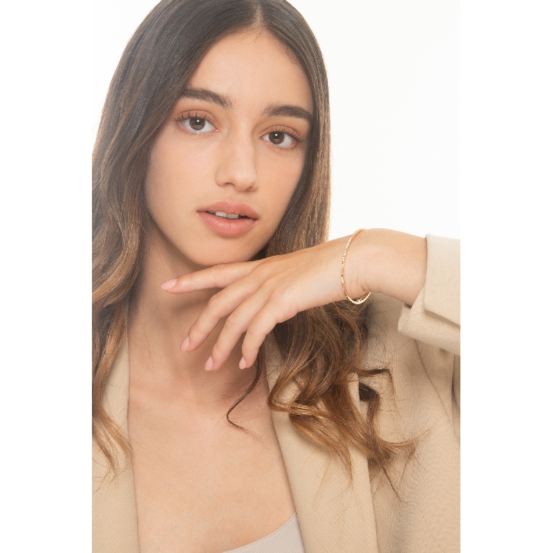 Pulsera semi rígida en oro rosa 18k con diamantes Pulsera semi rígida en oro rosa 18k con diamantes