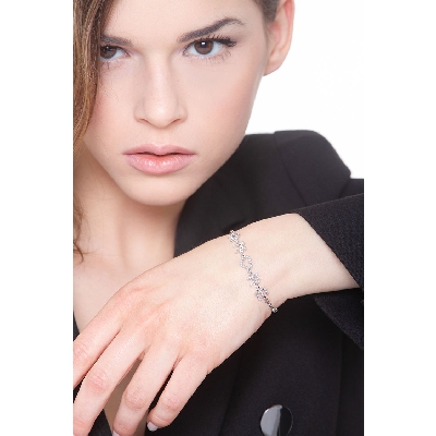 Pulsera letras AMORE oro blanco y diamantes