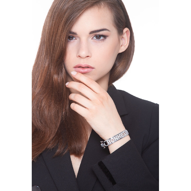 Brazalete rígido con la inscripción BONHEUR en oro blanco de 18k Brazalete rígido con la inscripción BONHEUR en oro blanco de 18k