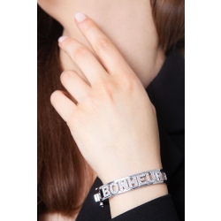 Brazalete rígido con la inscripción BONHEUR en oro blanco de 18k 2