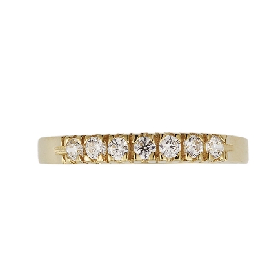 Anillo en oro amarillo 18k con siete circonitas