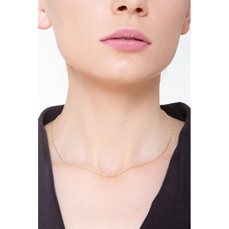 Collar con pequeñas bolitas en oro amarillo de 18k Collar con pequeñas bolitas en oro amarillo de 18k