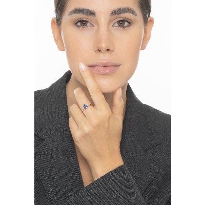 Anillo oro blanco 18 quilates con tanzanita central y diamantes