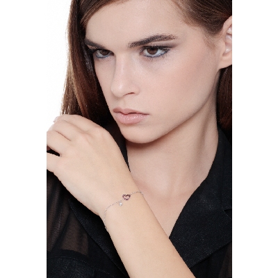 Pulsera oro blanco 18k con colgante corazón rubíes y diamante
