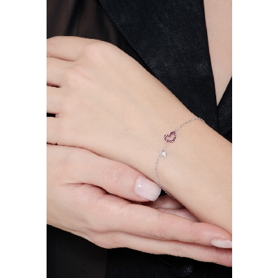 Pulsera oro blanco 18k con colgante corazón rubíes y diamante