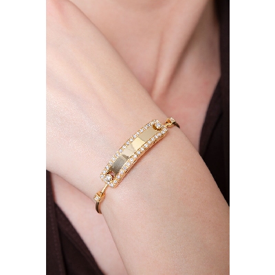 Pulsera placa oro amarillo de 18 quilates engastada con diamantes