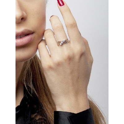 Anillo tres bandas abiertas en oro 18k con tres diamantes 0.30 ct