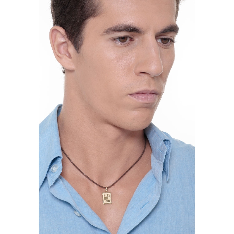 Medalla en oro amarillo de 18k pergamino