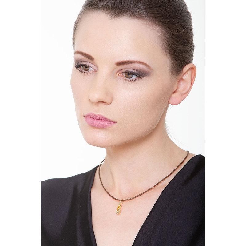 Colgante zapatilla de danza en oro amarillo 18k