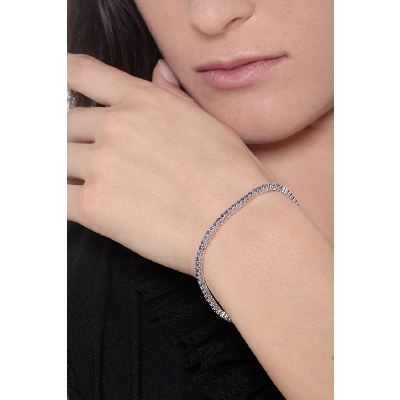 Pulsera riviera en oro blanco de 18k con zafiros azules