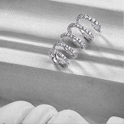 Anillo de resorte en oro blanco 18k con diamantes