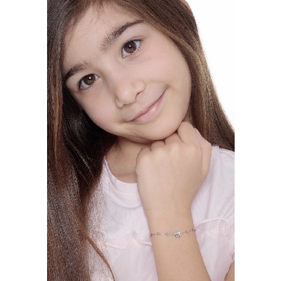 Pulsera en oro blanco de 18 quilates con lazo y circonitas